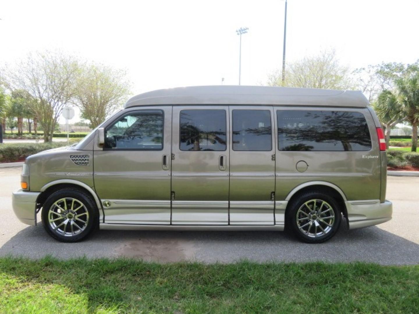 2013 /Beige Two Tone GMC Savana RV G1500 3LT (1GDS7DC45D1) with an 5.3L V8 OHV 16V engine, 4-Speed Automatic transmission, located at 4301 Oak Circle #19, Boca Raton, FL, 33431, (954) 561-2499, 26.388861, -80.084038 - You are looking at a Gorgeous 2013 GMC Savana 1500 High Top Conversion Van Explorer Limited SE Package Handicap Wheelchair Conversion Van with 72K Original Miles, Side Entry Braun Millennium Series Wheelchair Lift, Rubber Floor, Q-Straint Tie Down System, Navigation, Back Up Camera, Huge flat Screen - Photo#12